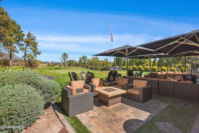 view of patio featuring a fire pit