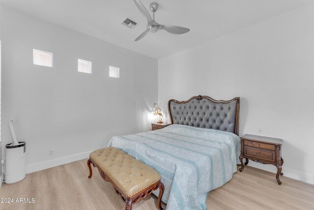 bedroom featuring light hardwood / wood-style flooring and ceiling fan