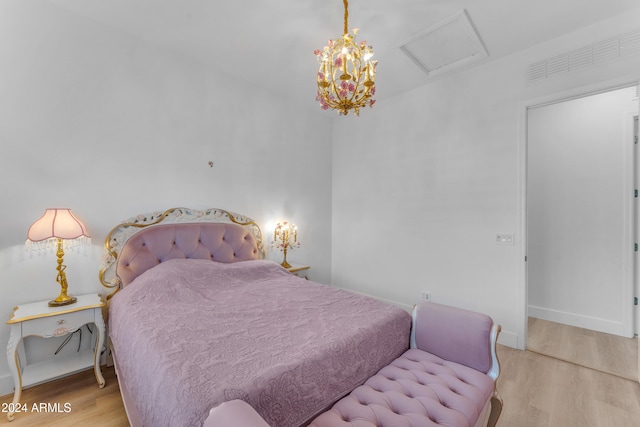 bedroom with light hardwood / wood-style floors