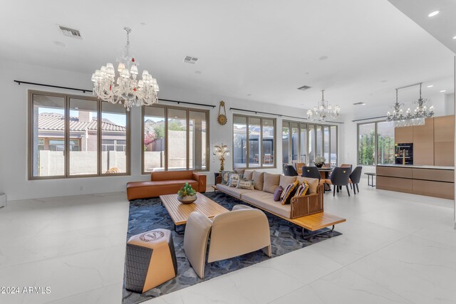 living room featuring a notable chandelier