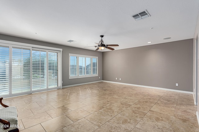 spare room featuring ceiling fan