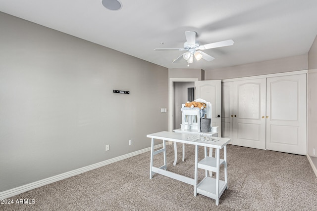 office area featuring carpet floors and ceiling fan