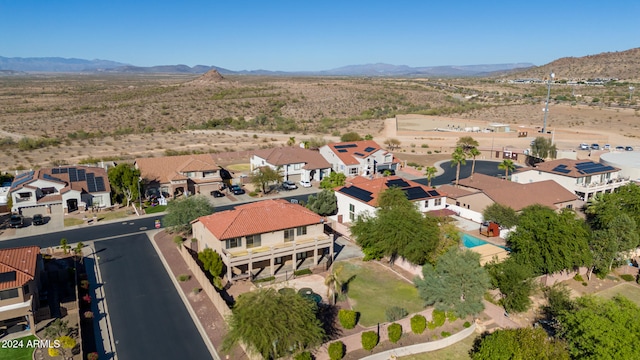 birds eye view of property featuring a mountain view