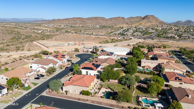 drone / aerial view featuring a mountain view