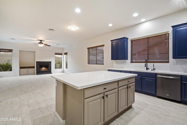 3551 W Hidden Mountain Ln, Anthem, AZ 85086 - kitchen featuring a sink, light countertops, ceiling fan, and stainless steel dishwasher