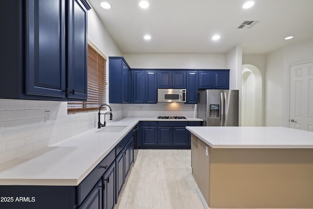 3551 W Hidden Mountain Ln, Anthem, AZ 85086 - kitchen featuring blue cabinets, visible vents, a sink, stainless steel appliances, and recessed lighting
