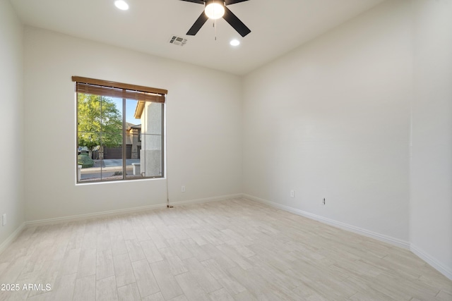 3551 W Hidden Mountain Ln, Anthem, AZ 85086 - spare room featuring light wood-style flooring, recessed lighting, baseboards, visible vents, and ceiling fan