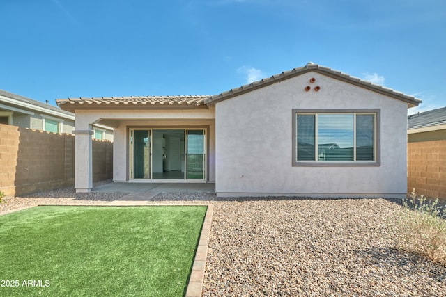 rear view of house with a patio area