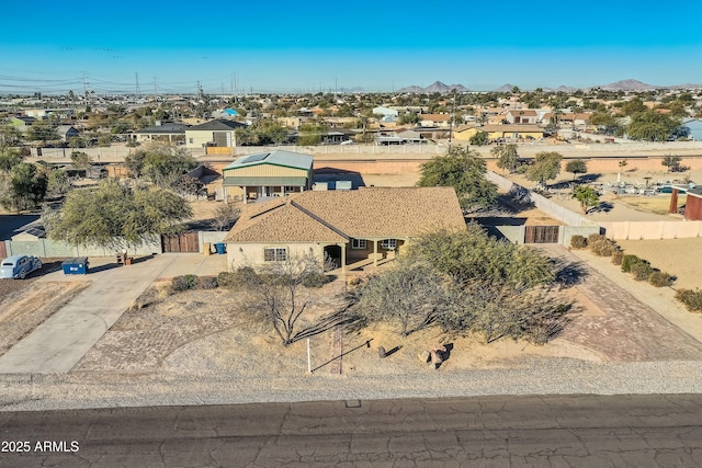 birds eye view of property featuring a mountain view