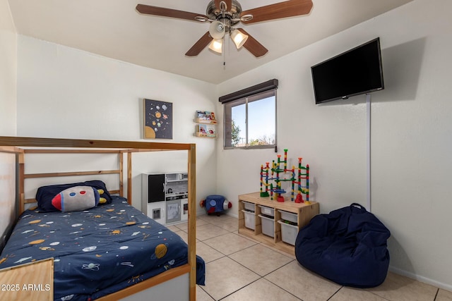 tiled bedroom featuring ceiling fan