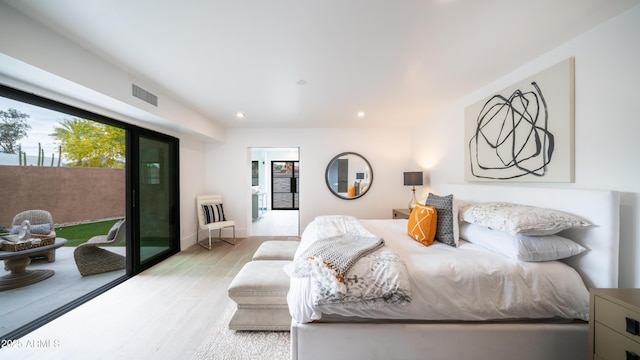 bedroom with visible vents, access to exterior, recessed lighting, and light wood-style floors