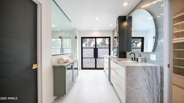 full bathroom featuring tile patterned floors, vanity, and recessed lighting
