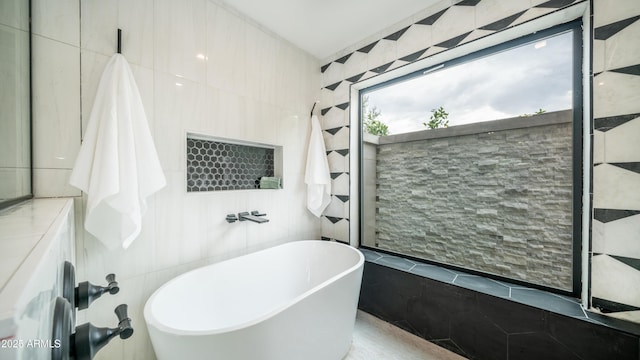 4434 E Camelback Rd Unit 128, Phoenix, AZ 85018 - bathroom featuring a freestanding tub