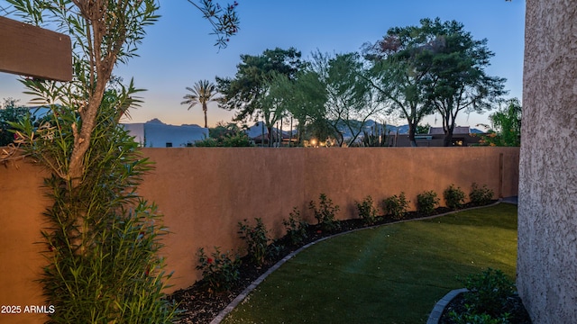 4434 E Camelback Rd Unit 128, Phoenix, AZ 85018 - view of yard at dusk