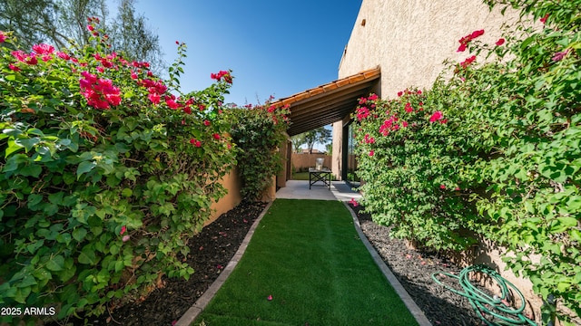 4434 E Camelback Rd Unit 128, Phoenix, AZ 85018 - fenced backyard featuring a patio area