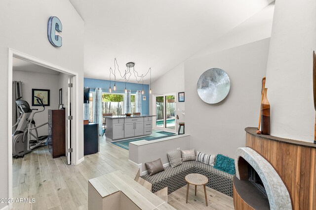 10838 N 10th St, Phoenix, AZ 85020 - living area featuring lofted ceiling and light wood-type flooring