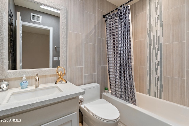 10838 N 10th St, Phoenix, AZ 85020 - bathroom with shower / tub combo, vanity, toilet, and decorative backsplash