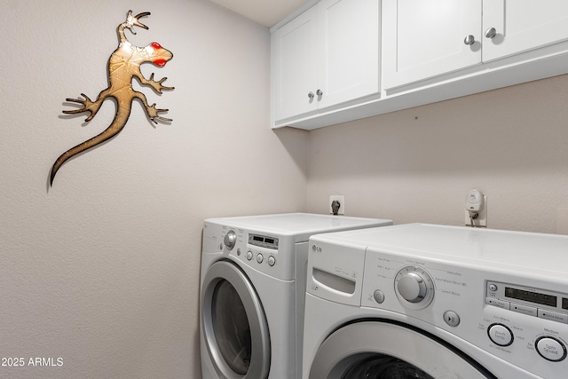 10838 N 10th St, Phoenix, AZ 85020 - washroom featuring cabinet space and washer and dryer