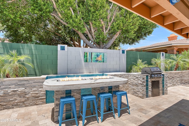 10838 N 10th St, Phoenix, AZ 85020 - view of patio featuring exterior bar and an outdoor fire pit