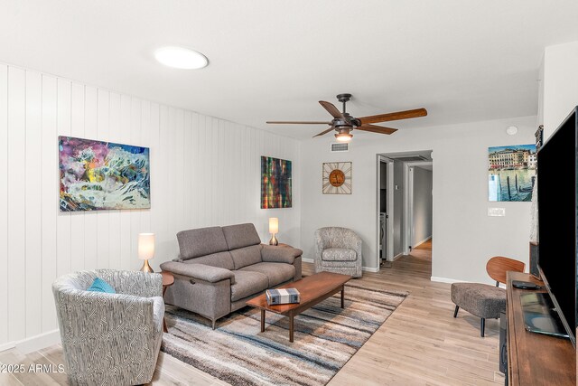 10838 N 10th St, Phoenix, AZ 85020 - living room with light wood-type flooring, ceiling fan, and baseboards