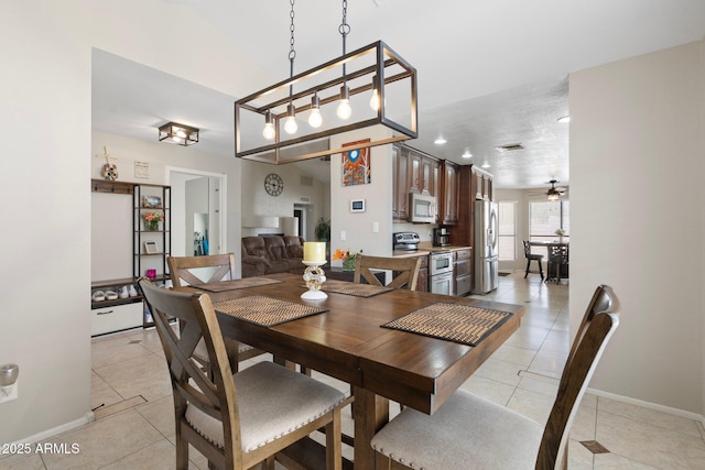 7503 W Julie Dr, Glendale, AZ 85308 - dining area featuring light tile patterned floors, baseboards, a ceiling fan, and recessed lighting