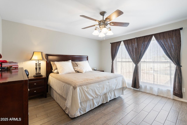 7503 W Julie Dr, Glendale, AZ 85308 - bedroom with wood finished floors and ceiling fan