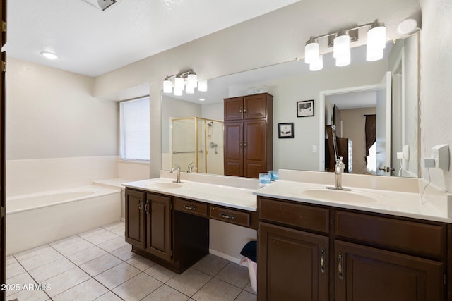 7503 W Julie Dr, Glendale, AZ 85308 - bathroom with a stall shower, a garden tub, double vanity, and tile patterned flooring