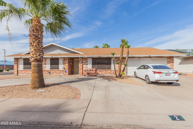 ranch-style home with a garage