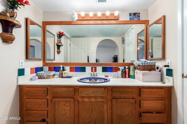 bathroom with large vanity