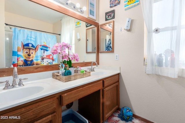 bathroom with double vanity