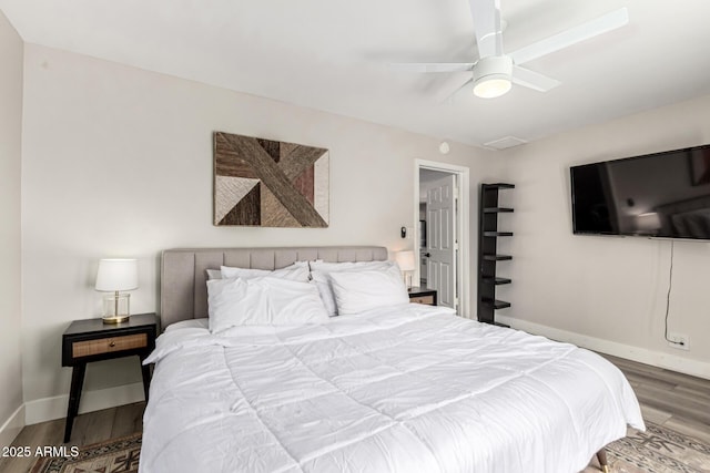 7440 E Hubbell St, Scottsdale, AZ 85257 - bedroom featuring wood finished floors and ceiling fan