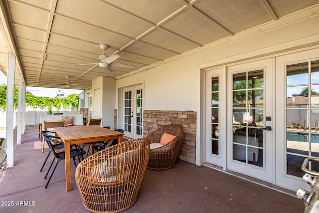 7440 E Hubbell St, Scottsdale, AZ 85257 - view of patio with french doors, ceiling fan, and outdoor dining space
