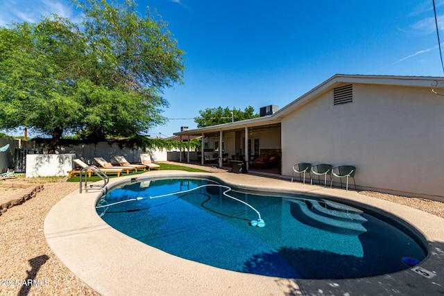 7440 E Hubbell St, Scottsdale, AZ 85257 - view of swimming pool with a patio area and a fenced backyard