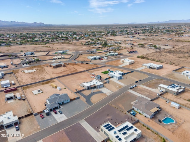 drone / aerial view featuring a mountain view