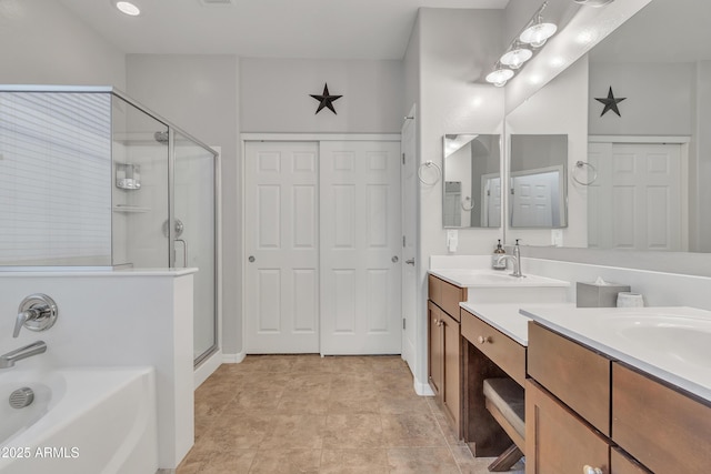 bathroom featuring vanity and plus walk in shower