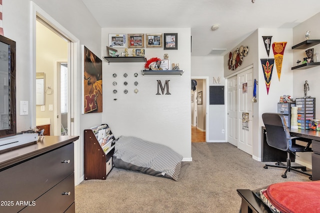 carpeted bedroom featuring a closet