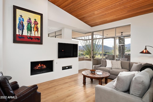 living room with wood-type flooring, wooden ceiling, and vaulted ceiling