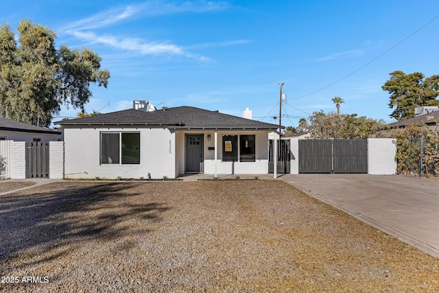 ranch-style house featuring covered porch