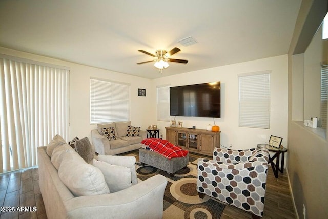 19886 W Woodlands Ave, Buckeye, AZ 85326 - living room featuring wood finished floors and a ceiling fan
