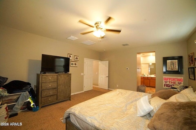 19886 W Woodlands Ave, Buckeye, AZ 85326 - bedroom with carpet flooring, connected bathroom, and ceiling fan