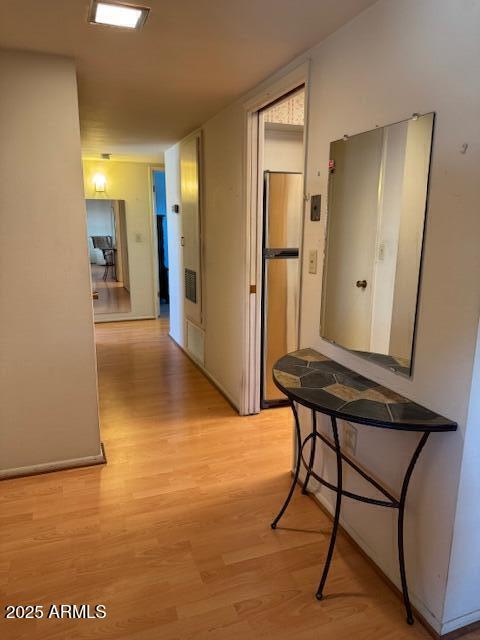 hall featuring light hardwood / wood-style floors