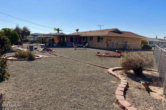 rear view of house with a patio area