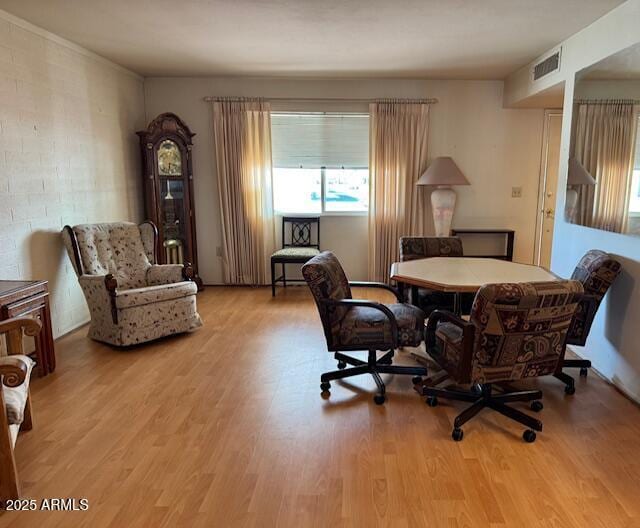 office area with light hardwood / wood-style flooring