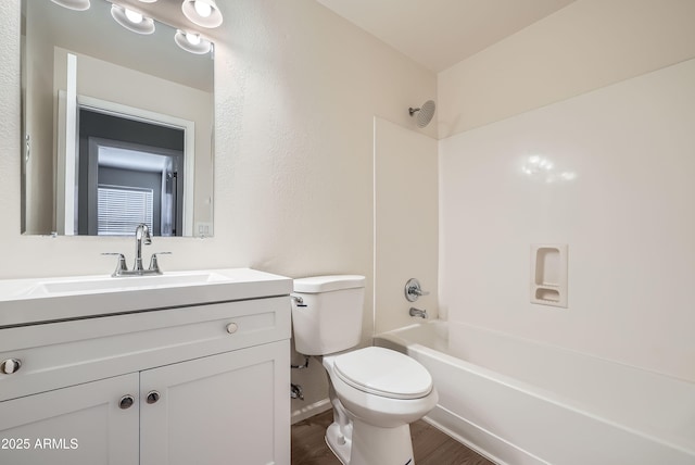 12333 W Marshall Ave, Litchfield Park, AZ 85340 - full bath with toilet, wood finished floors, vanity, and shower / washtub combination