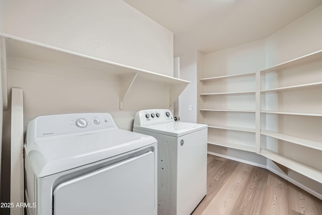 12333 W Marshall Ave, Litchfield Park, AZ 85340 - laundry room with light wood-style floors, separate washer and dryer, and laundry area
