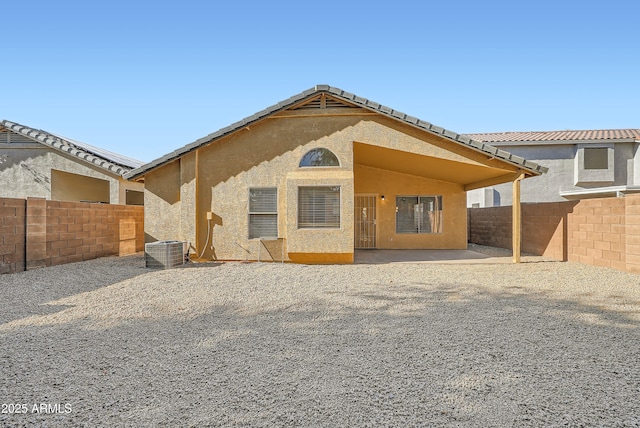 12333 W Marshall Ave, Litchfield Park, AZ 85340 - rear view of house featuring a patio, a fenced backyard, cooling unit, and stucco siding