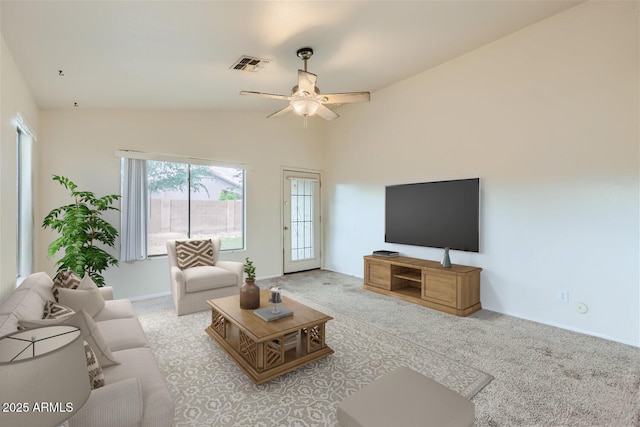 12333 W Marshall Ave, Litchfield Park, AZ 85340 - living area featuring baseboards, a ceiling fan, carpet floors, visible vents, and lofted ceiling