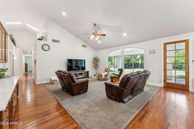3750 E Palm St, Mesa, AZ 85215 - living room featuring wood finished floors, a ceiling fan, baseboards, high vaulted ceiling, and recessed lighting
