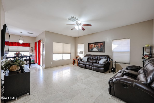 living room with ceiling fan