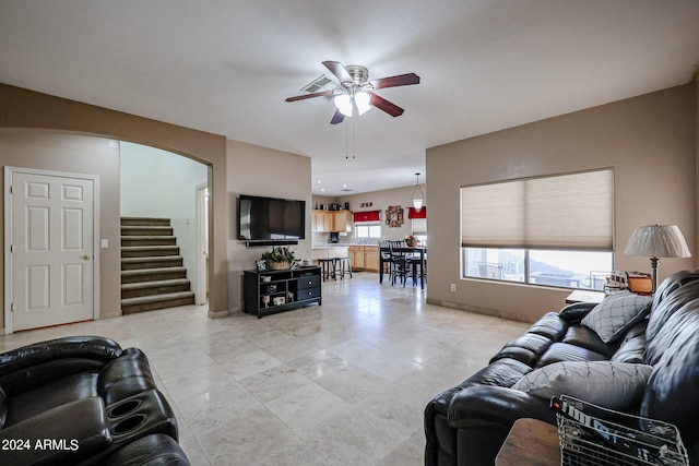 living room featuring ceiling fan